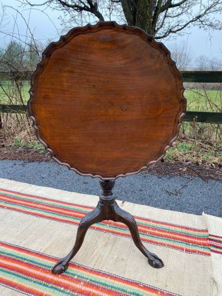 A 19th Century English Mahogany Pie Crust Tilt Top Tea Table W/ Ball & Claw Feet