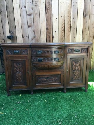 Antique carved wood sideboard/ cabinet/ chest of drawers,  4 drawers,  3 cabinets 3