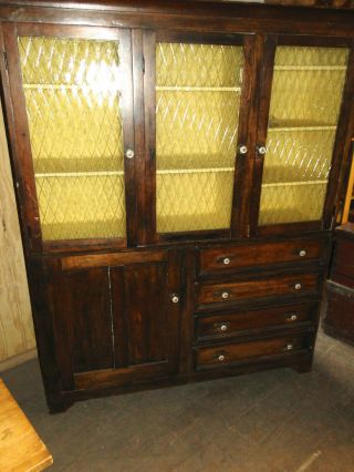 Pine Kitchen Cupboard With Amber Glass Doors