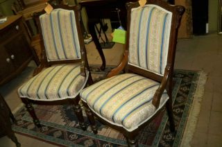 Pair Matching Victorian Walnut Parlor Chairs With Hip Rest,  Front Brass Castors
