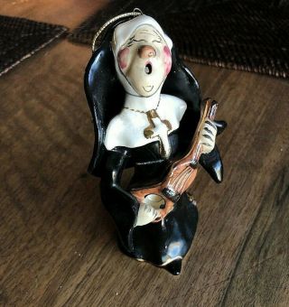 Blue Sky Corp.  2001 Singing Nun Ornament Figurine Heather Gilded Guitar China