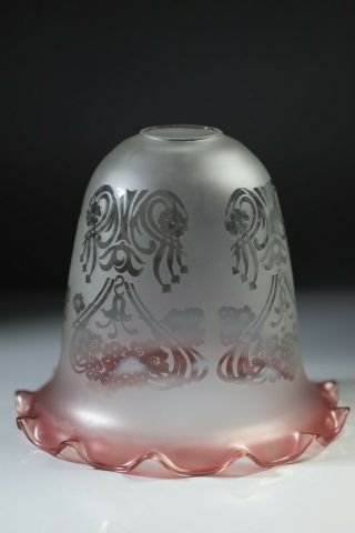 A Victorian Etched Cranberry Tinted Glass Lamp Shade