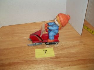 Ensco Country Cousin Figurines - Girl On Snowmobile