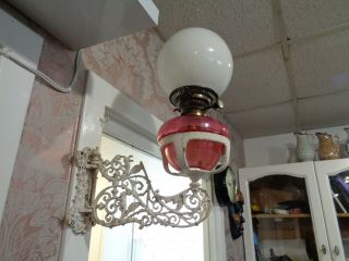 Early Victorian Cranberry Glass Oil Lamp On A Swivel Bracket