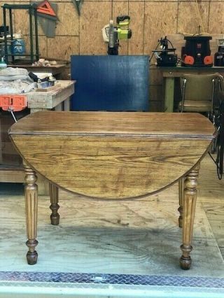 Early American Style Antique Oak Drop Leaf Dining Table -