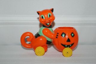 Vintage Rosbro Rosen Hard Plastic Halloween Cat Pushing Pumpkin Candy Container