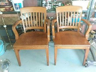2 W.  H.  Gunlocke Barrel Back Oak Chairs