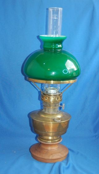 Vintage Brass Aladdin Gas Lamp With Funnel And Green Shade On Wooden Base