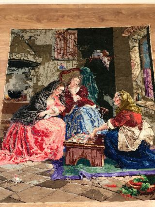 A large antique 19th century woolwork tapestry of three ladies playing cards 3