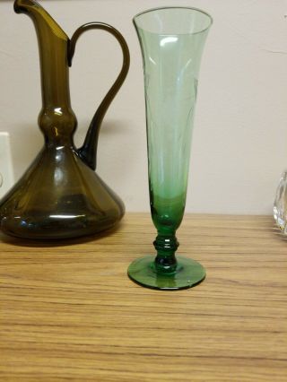 Vintage green glass bud vase footed with etched flowers. 3