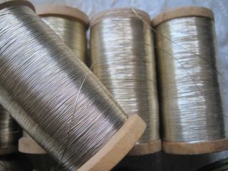 1 ANTIQUE FRENCH,  GOLD METAL THREAD SPOOL 3 1/4 INCHES TALL YARDAGE 2