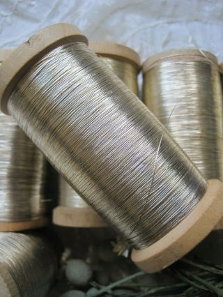 1 ANTIQUE FRENCH,  GOLD METAL THREAD SPOOL 3 1/4 INCHES TALL YARDAGE 3