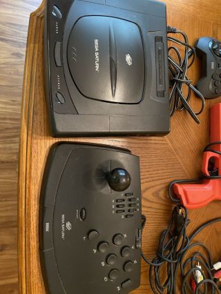 Vintage Sega Saturn system with accessories and (7) games 2