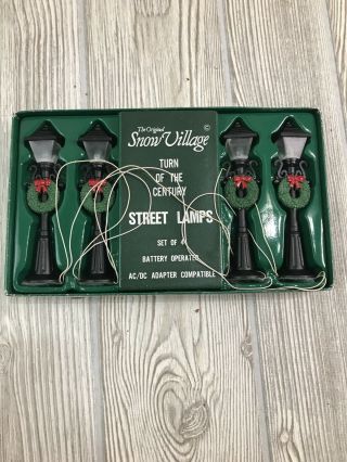 The Snow Village Turn Of The Century Light Up Street Lamps Set Of 4