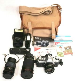 Canon Ae - 1 Program Camera W/ 2 Lenses Manuals And Accesories Vintage