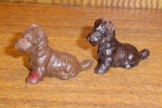 2 Vintage Cast Iron Sitting Dog Figurines - 1 3/8 " Tall
