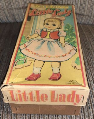 Vintage Japan Wind Up Doll WALKING LITTLE LADY Tin Toy Good 2