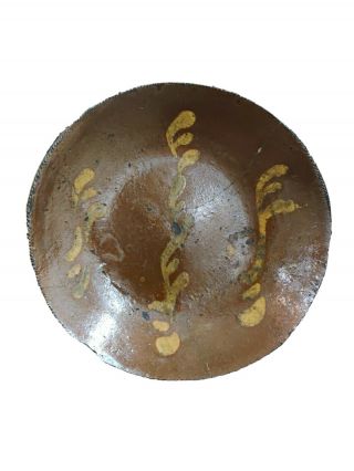 Early Pennsylvania Slip Decorated Redware Plate.