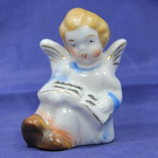 Vintage Occupied Japan Sitting Angel Figurine.  Tiny 2 1/4 " Tall.