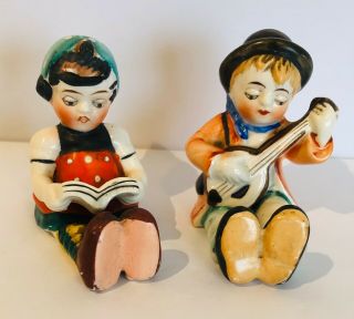Vintage Made In Japan Boy Playing Instrument & Girl Reading Salt & Pepper Shaker