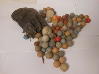 Approximately 100 Antique Clay & Stoneware Marbles With An Leather Bag