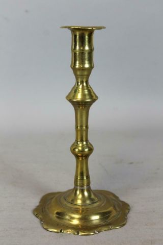 Early 18th C English Qa Brass Candlestick Baluster Form And A Petal Base