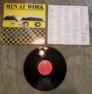 Men At Work " Business As Usual " Vinyl Record L.  P.  With Lyrics Sleeve
