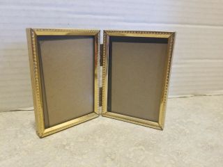 Vtg.  Gold - Tone Dual Hinged,  Embossed Metal Picture Frame.  3 1/2 " X 2 1/2 "