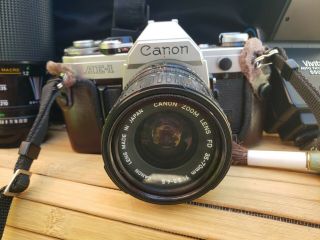 Vintage Canon AE - 1 Camera with case,  flash,  zoom lense,  manuals,  brush complete 2