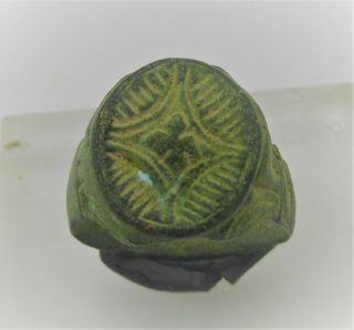 Detector Finds Ancient Viking Bronze Ring With Runic Engravings