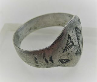 Detector Finds Ancient Viking Silver Ring With Punched Runic Triangles
