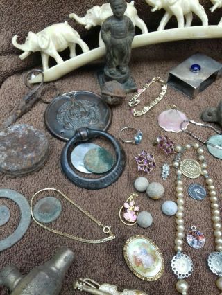 detecting finds,  jewellery,  bits,  coins,  some silver and maybe gold.  Unresearched 2