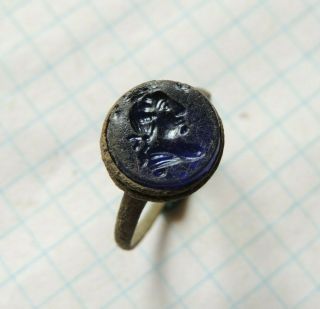 Ancient bronze ring Middle Ages with a human face 2