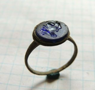 Ancient bronze ring Middle Ages with a human face 3