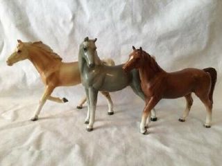 A Quality Ceramic Palomino Arabian & Quarter Horse Figurines (3)