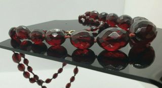 Vintage 1920 ' s Faceted Cherry Amber Bakelite Necklace 63.  8g 2