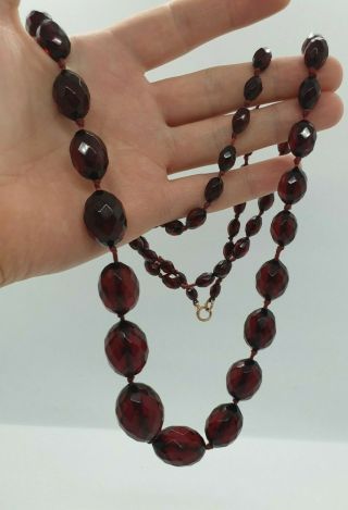 Vintage 1920 ' s Faceted Cherry Amber Bakelite Necklace 63.  8g 3