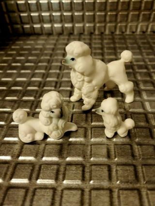 Vtg Rare Japan Porcelain Poodle Dog Set Of (3) Figurines White With Blue Faces
