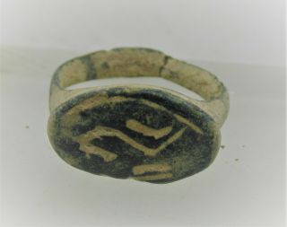 Detector Finds Ancient Viking Bronze Ring With Engraved Serpent