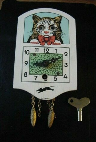 Vintage Mini Germany Wind Up Clock With Moving Eyes In The Cat Face