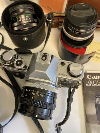 Canon AE - 1 35mm Vintage Camera,  Multiple Lenses,  Case,  Tripod 3