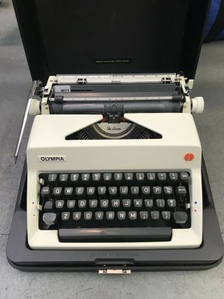 Vintage Olympia Deluxe Portable Typewriter With The Case - Great.