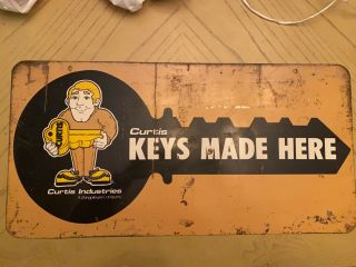 Vintage Curtis Man Keys Made Here Double Sided Metal Advertising Sign