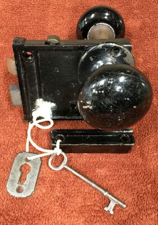 Antique Rim Lock Set With Key,  Key Plate,  Striker,  And Black Marble Knobs