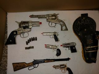 7 Vintage Toy Cap Guns,  50s Hubley Gene Autry,  Holster,  Nichols 38 W/bullets,  Pistol