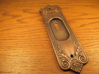 Old Stamped Brass ? Bronze ? Pocket Door Plate.  Escutcheon.  Very Ornate.