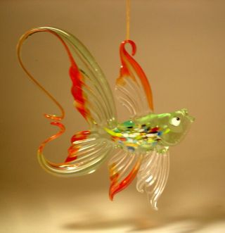 Blown Glass Art Figurine Light Green,  Red And Clear Fish With An Arched Tail