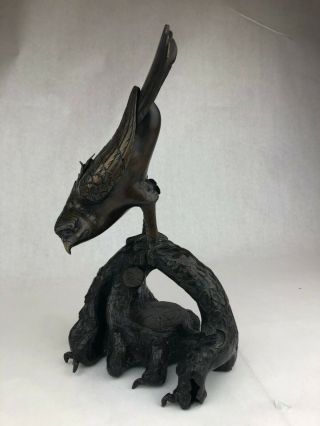 A Japanese Bronze Of A Bird Perched On A Tree