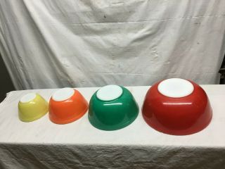 Vtg 4pc 60’s Pyrex Primary Colors Yellow Orange Green Red Nesting Mixing Bowls