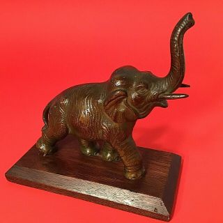 Vintage Elephant Figurine Solid Metal 5 1/4 " H 2 Lbs.  Trunk Up Wood Base